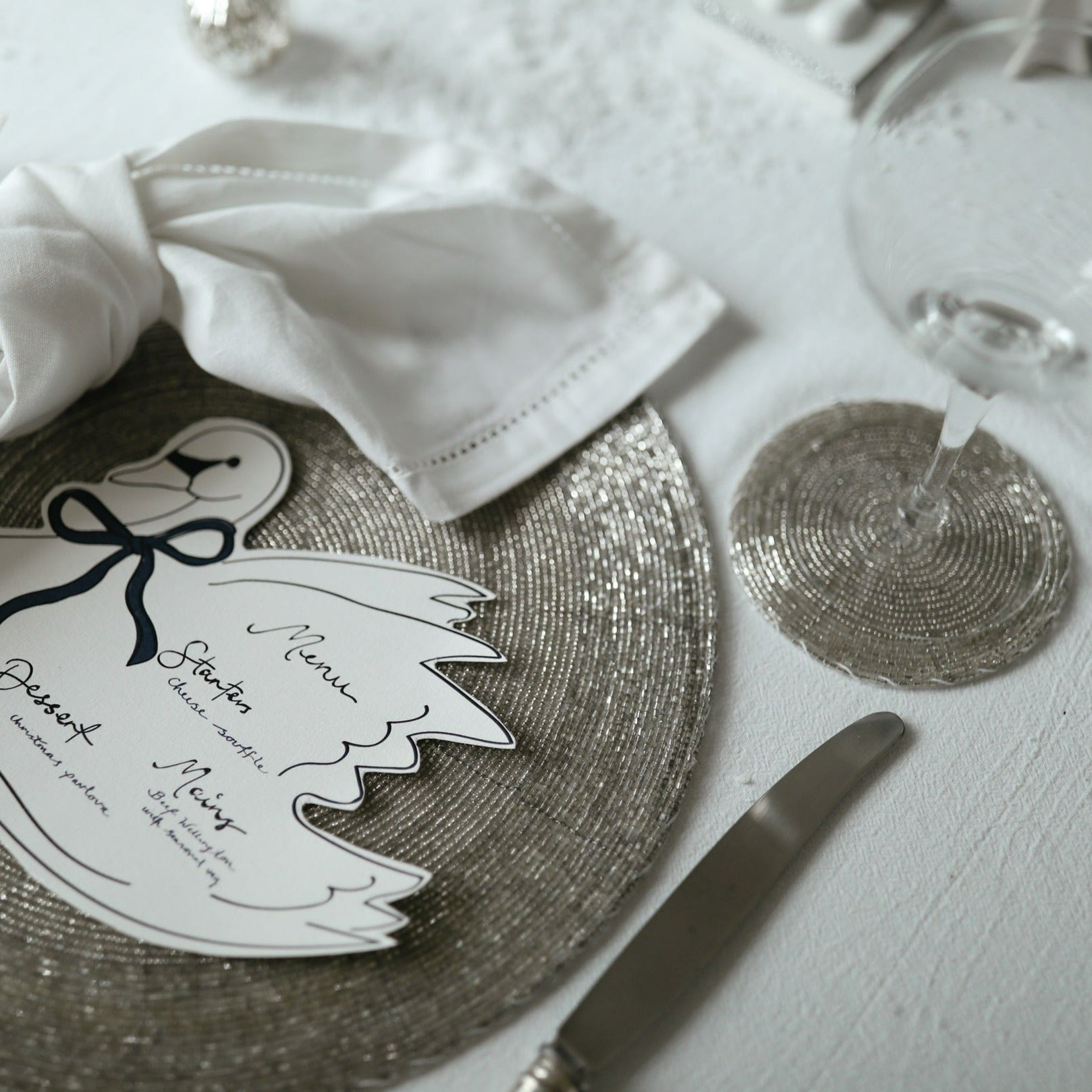 Silver beaded placemats set of four